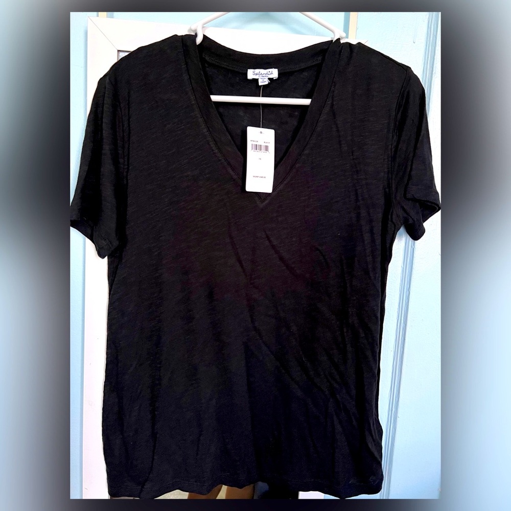 2 shirts. Splendid brand basic tee shirt. 
Relaxed, loose silhouette